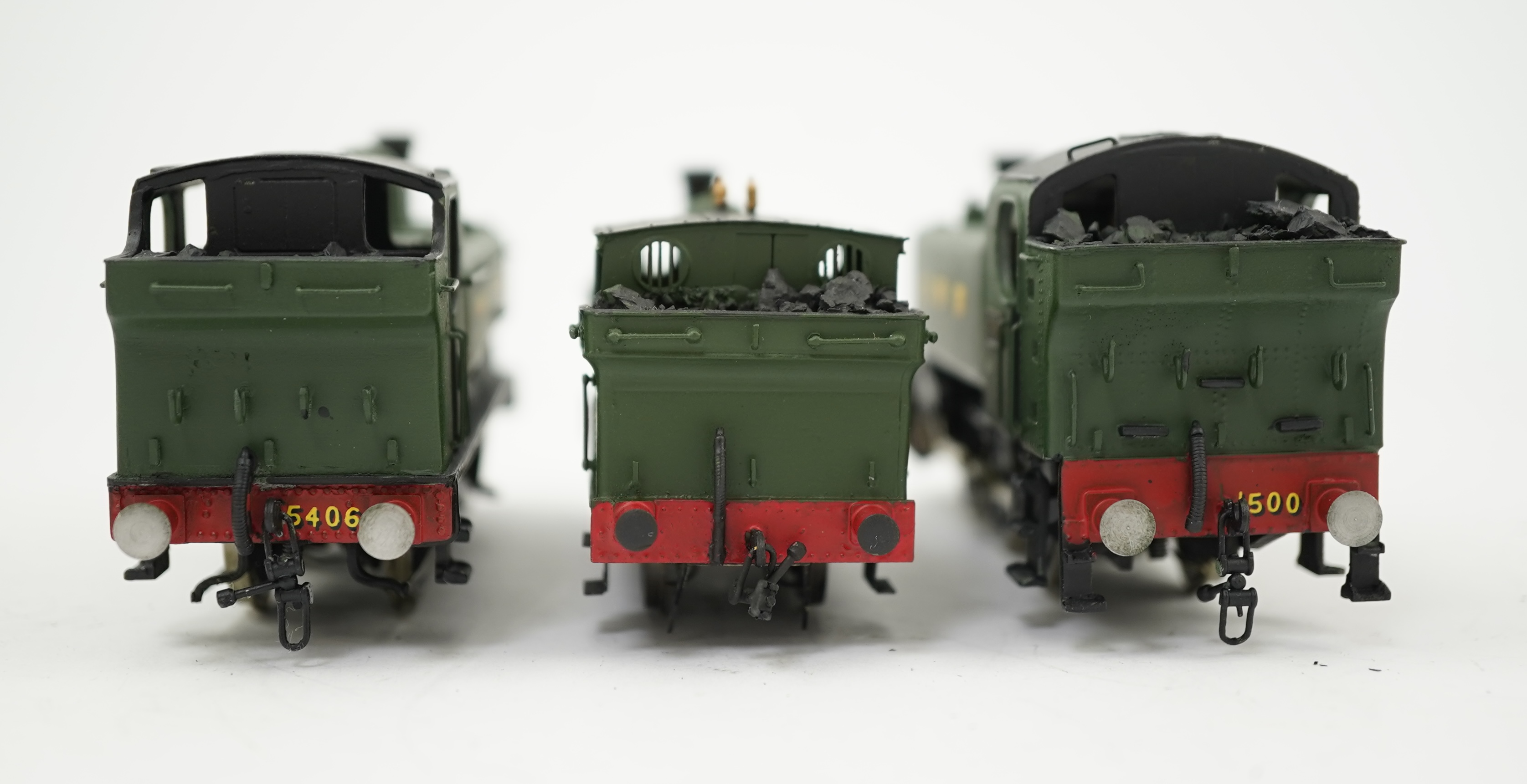 Three 00 gauge brass and white metal kit built GWR tank locomotives; a 15xx class 0-6-0T, 1500, together with an 54xx class 0-6-0PT, 5406, and a 19xx class 0-6-0PT, 1925, all constructed, painted and lined to a high stan
